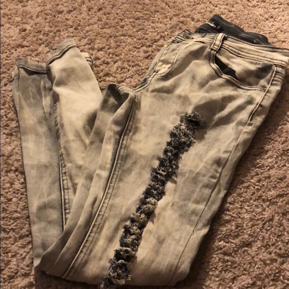 Ripped black grey jeans